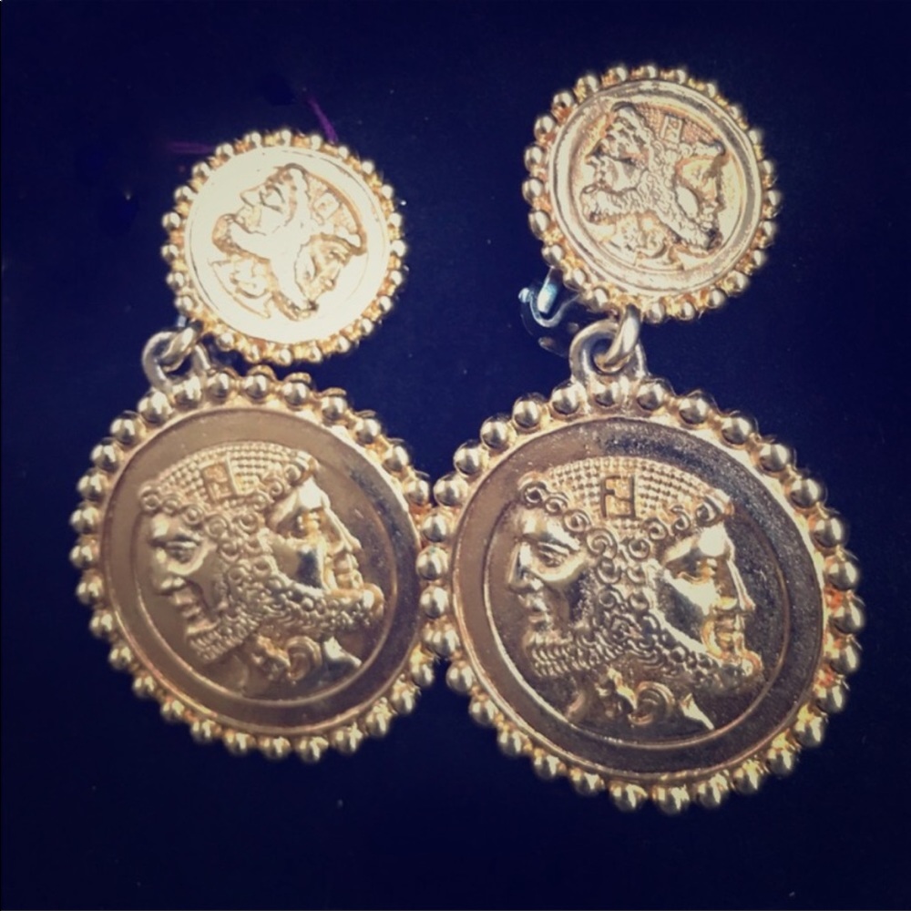 Authentic Rare Fendi clip on earrings. Clip is tight. Great condition.